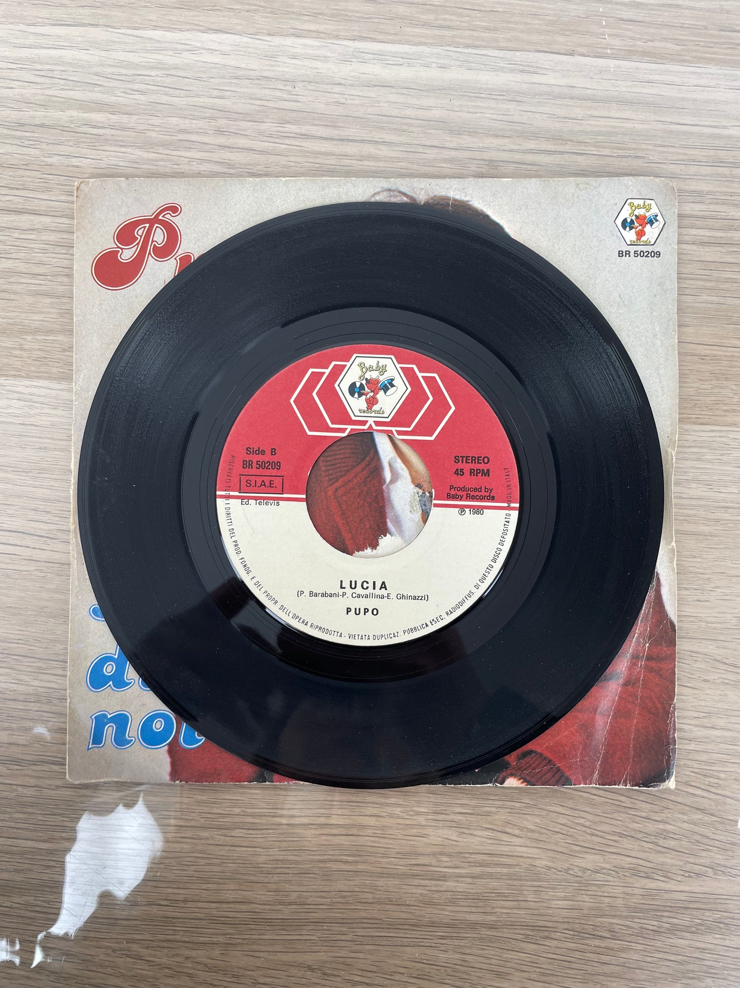 Disco 45 giri vinile Pupo Su Di Noi Lucia anno 1980
