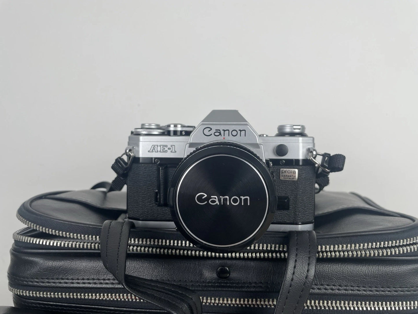 Fotocamera Canon AE-1 35mm SLR Film Camera Obiettivo 50mm Custodia +Battery Pack