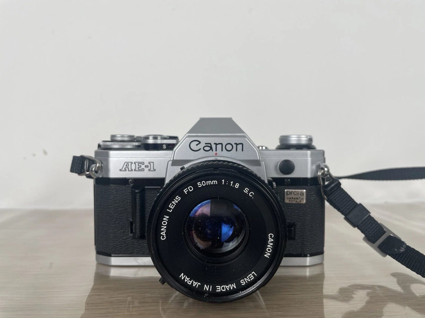 Fotocamera Canon AE-1 35mm SLR Film Camera Obiettivo 50mm Custodia +Battery Pack