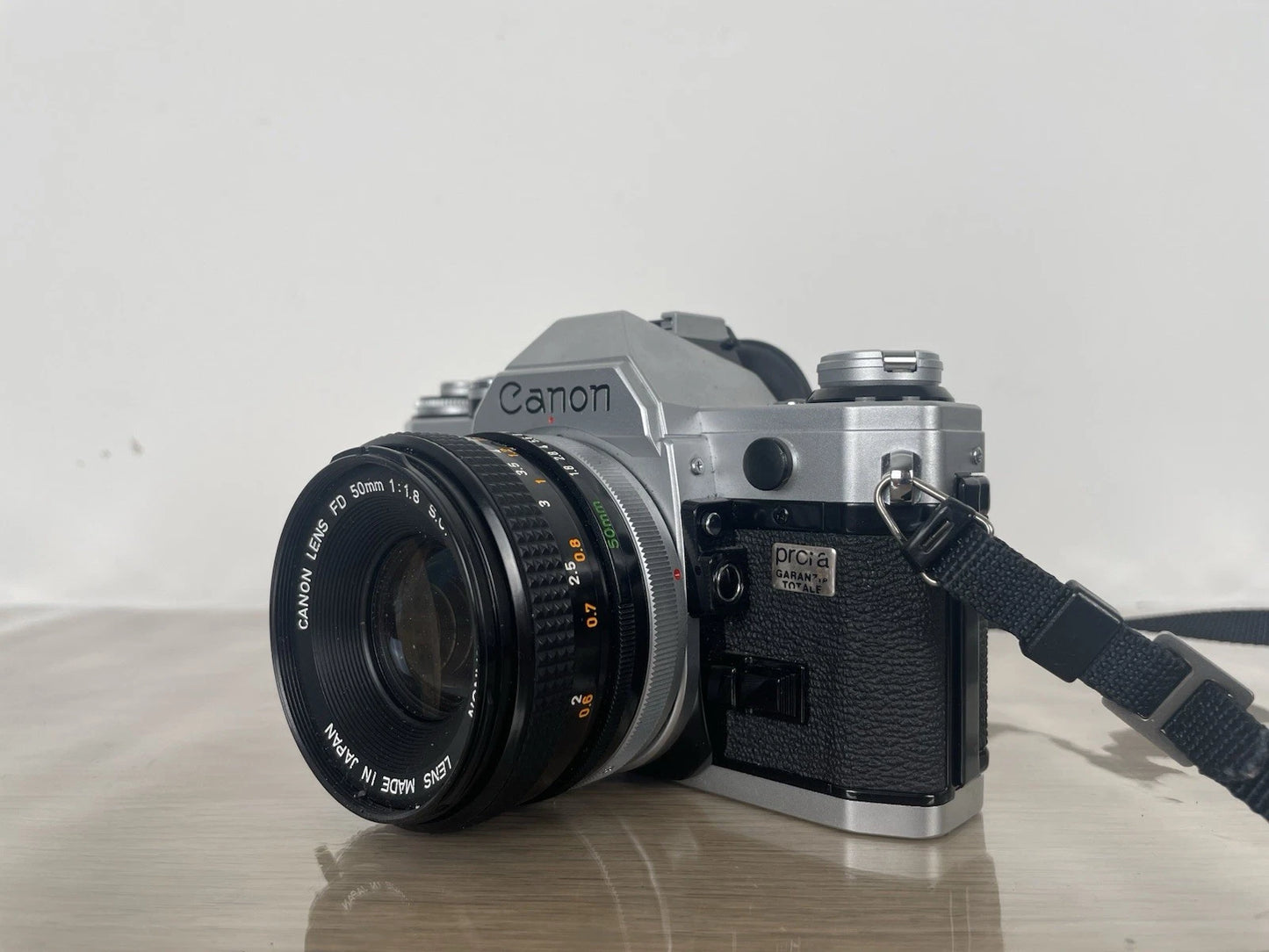 Fotocamera Canon AE-1 35mm SLR Film Camera Obiettivo 50mm Custodia +Battery Pack